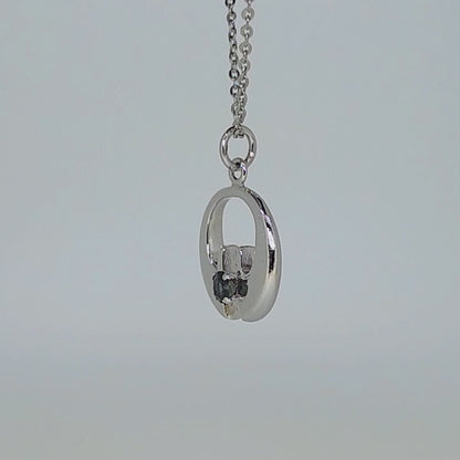 07745.0 - Sterling Silver Pendant set with either a blue or a teal coloured 4.25 mm about 0.50 carat natural Australian Sapphire 22 mm high