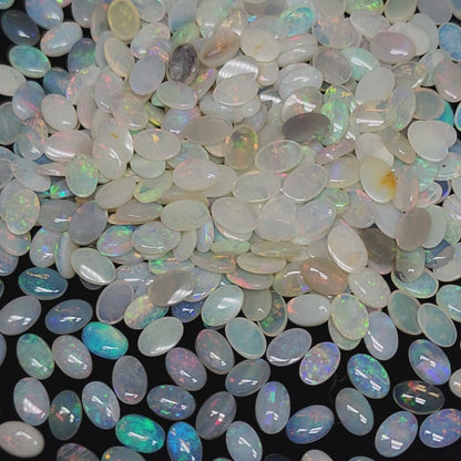 54068.0 - 6x4 mm Natural Sold White Australian Opal Oval Cabochon Cut in a Mixed Quality