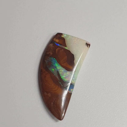 54463. Double Sided Boulder Opal: Tiger Claw Shape, 16 carats