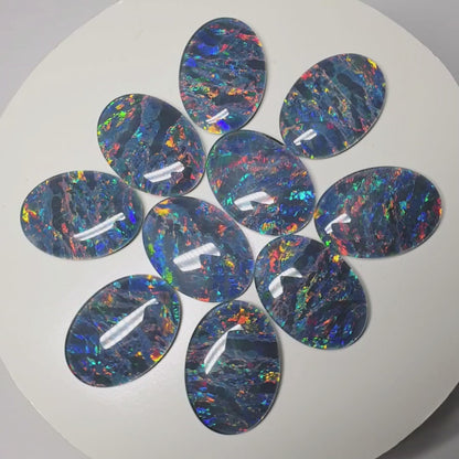 52022 - A Unique Set of 10 Matching 30x22 mm Oval Australian Opal Triplets