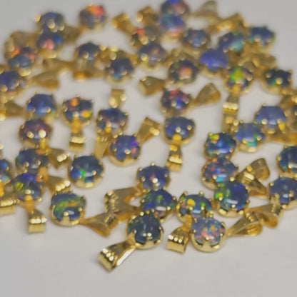 04392. Sterling Silver Gold Plated Opal Triplet Pendants