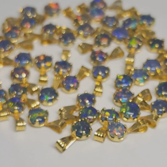 04392. Sterling Silver Gold Plated Opal Triplet Pendants